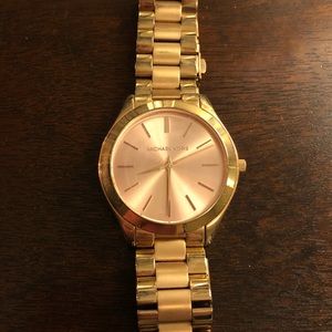 Slightly used mini slim runway rose gold watch!